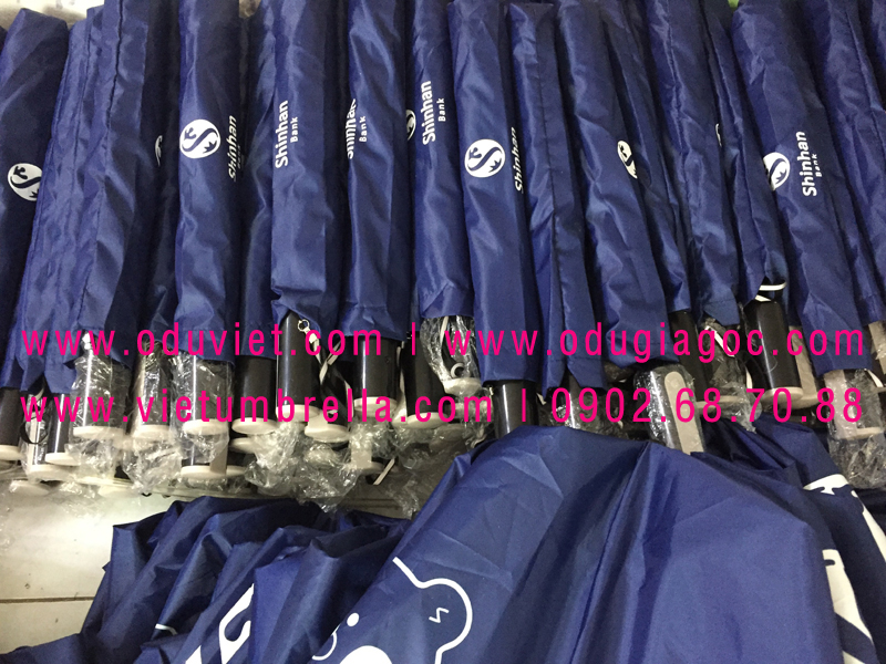 xưởng sản xuất ô dù cầm tay in logo quảng cáo